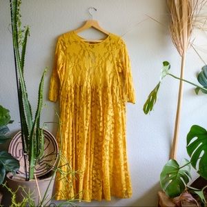 A sheer beautiful urban outfitters dress! Fantastic marigold color!